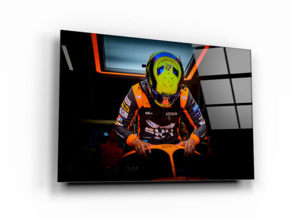 Lando Norris taking place in his car